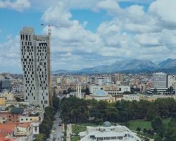 WHAT ARE THE GEOGRAPHICAL COORDINATES OF TIRANA?